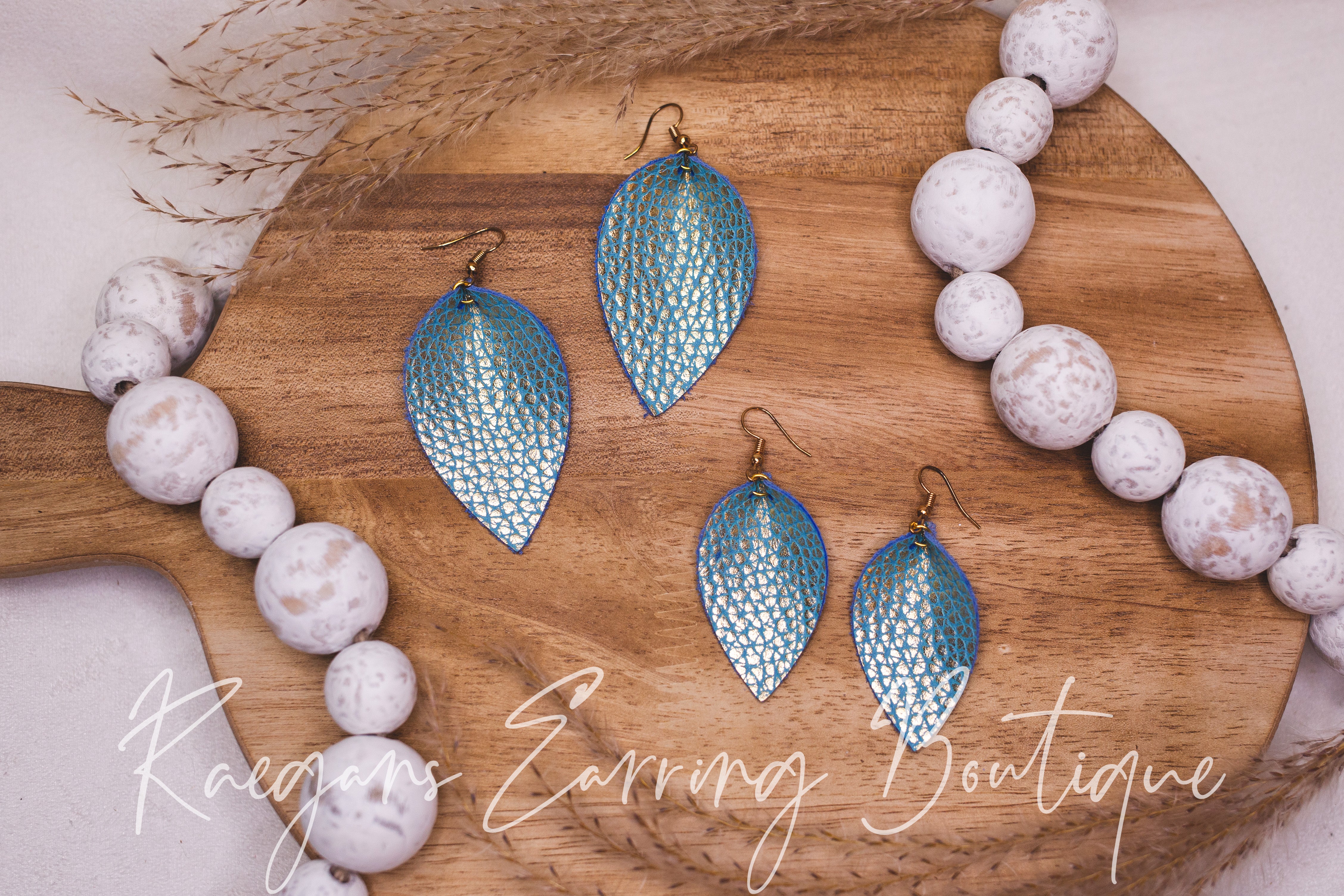 Blue and Metallic Gold Pinched Teardrops