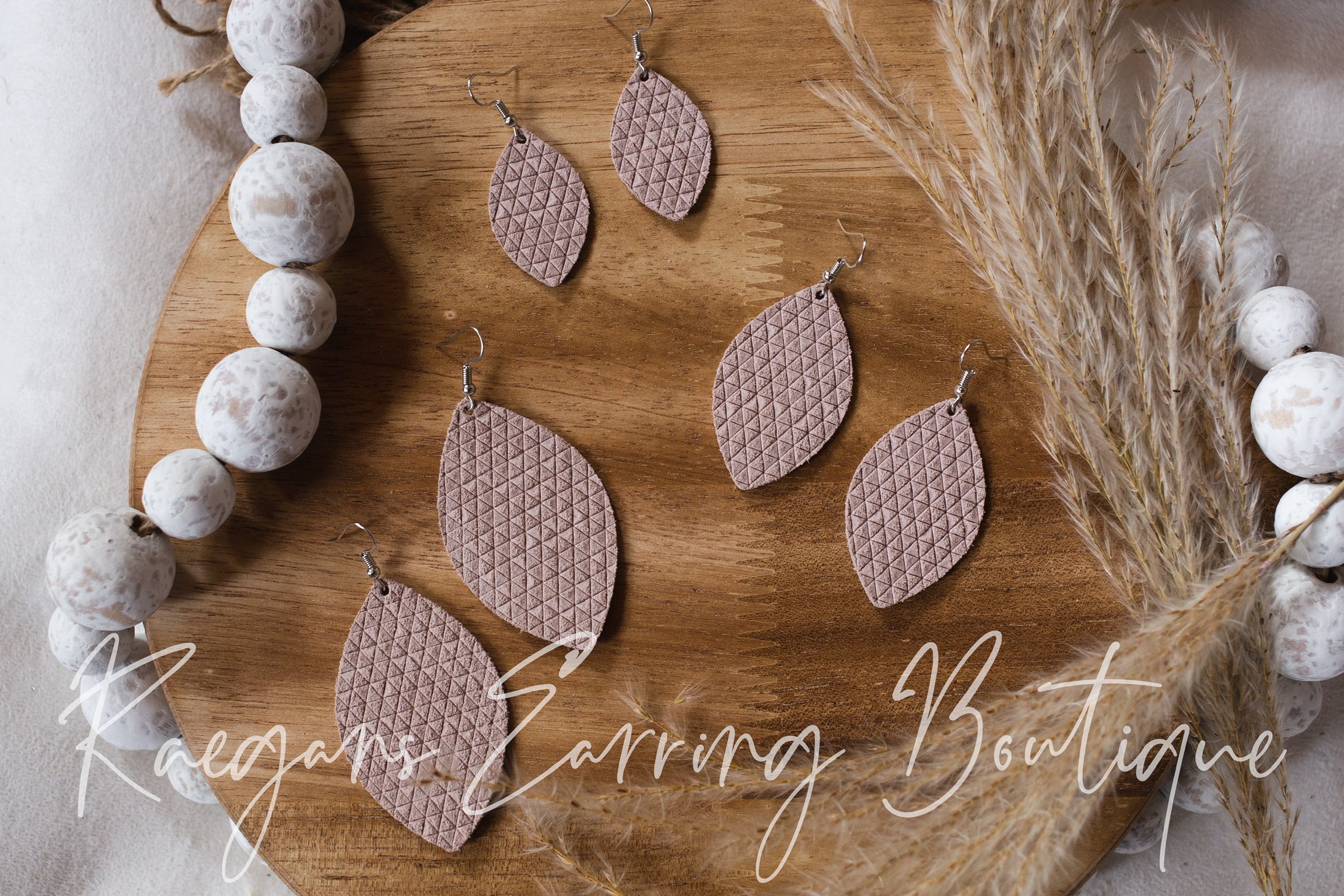 Nude Pink Triangle Textured Football-Shaped Earrings
