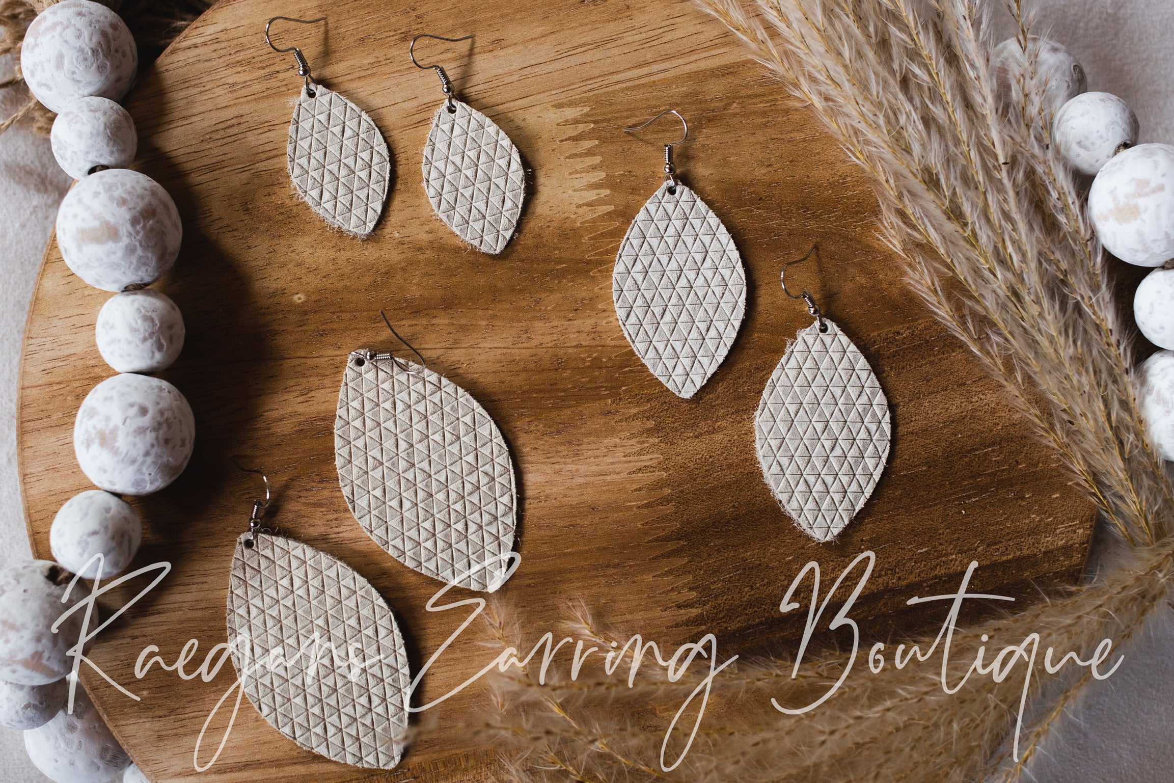 Winter White Triangle Textured Football Shaped Earrings